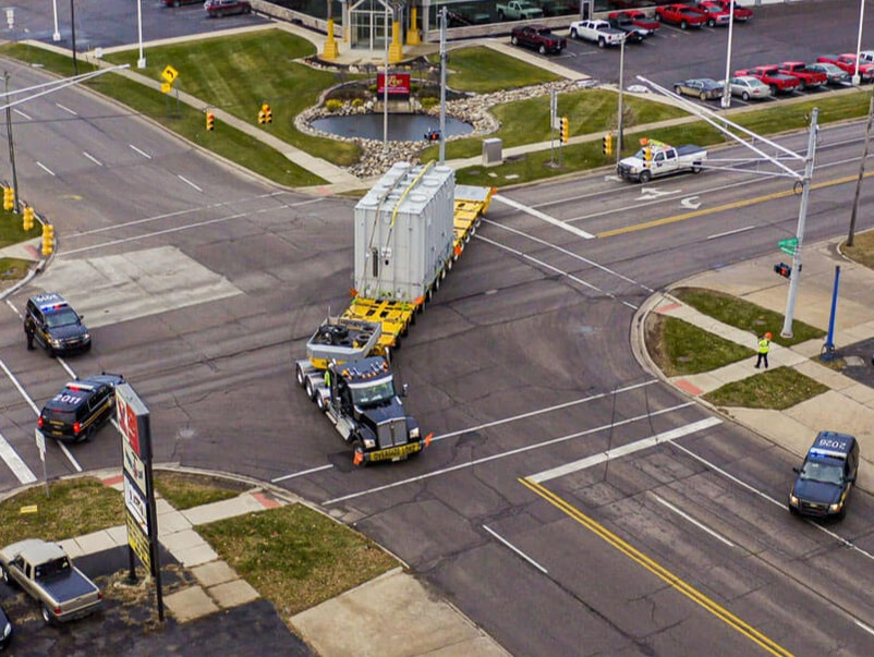 Buckingham uses 14 lines of Goldhofer to transport a transformer through an intersection