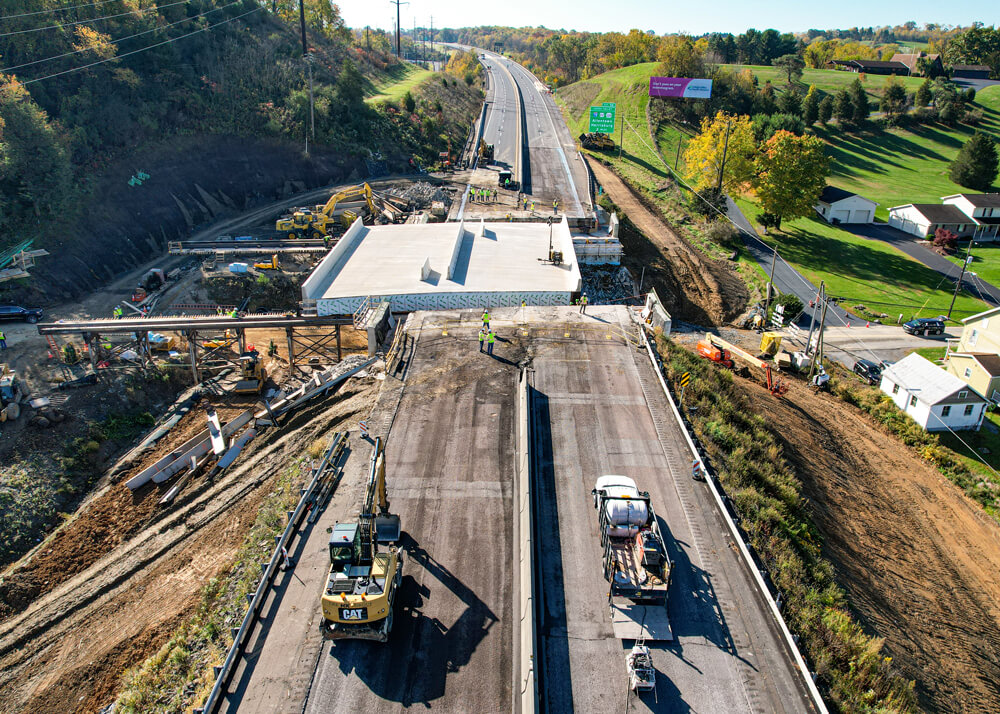 Drone shot of bridge segment partially in place on I-476 accelerated bridge replacement project