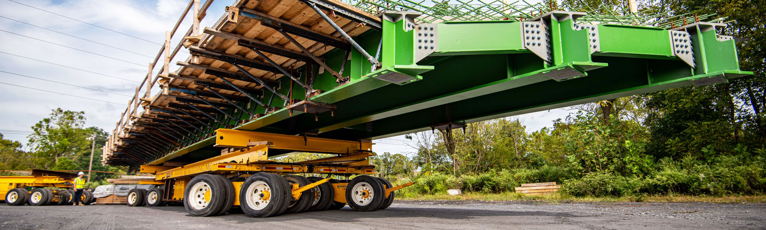Buckingham uses its adaptable self-propelled power dolly system to move a prefabricated bridge section