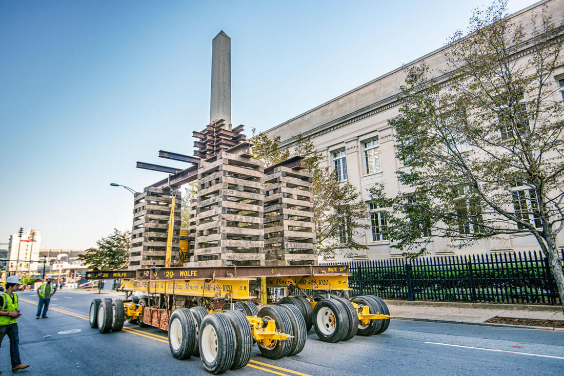 Buckingham transports a monument on an Adaptable Self-Propelled Dolly Transporter