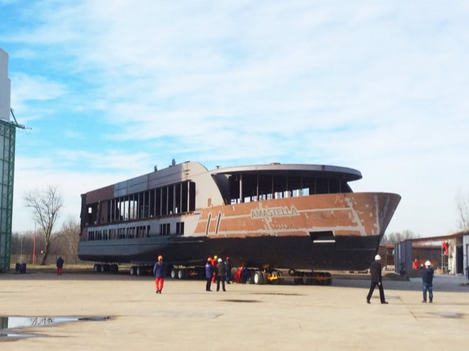 Buckingham Transport moves a large boat in a Serbian shipyard