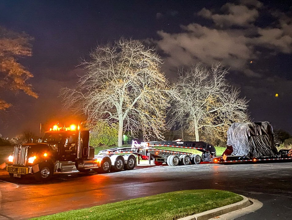 Buckingham completes a late night heavy haul run with a Trail King 13-axle RGN