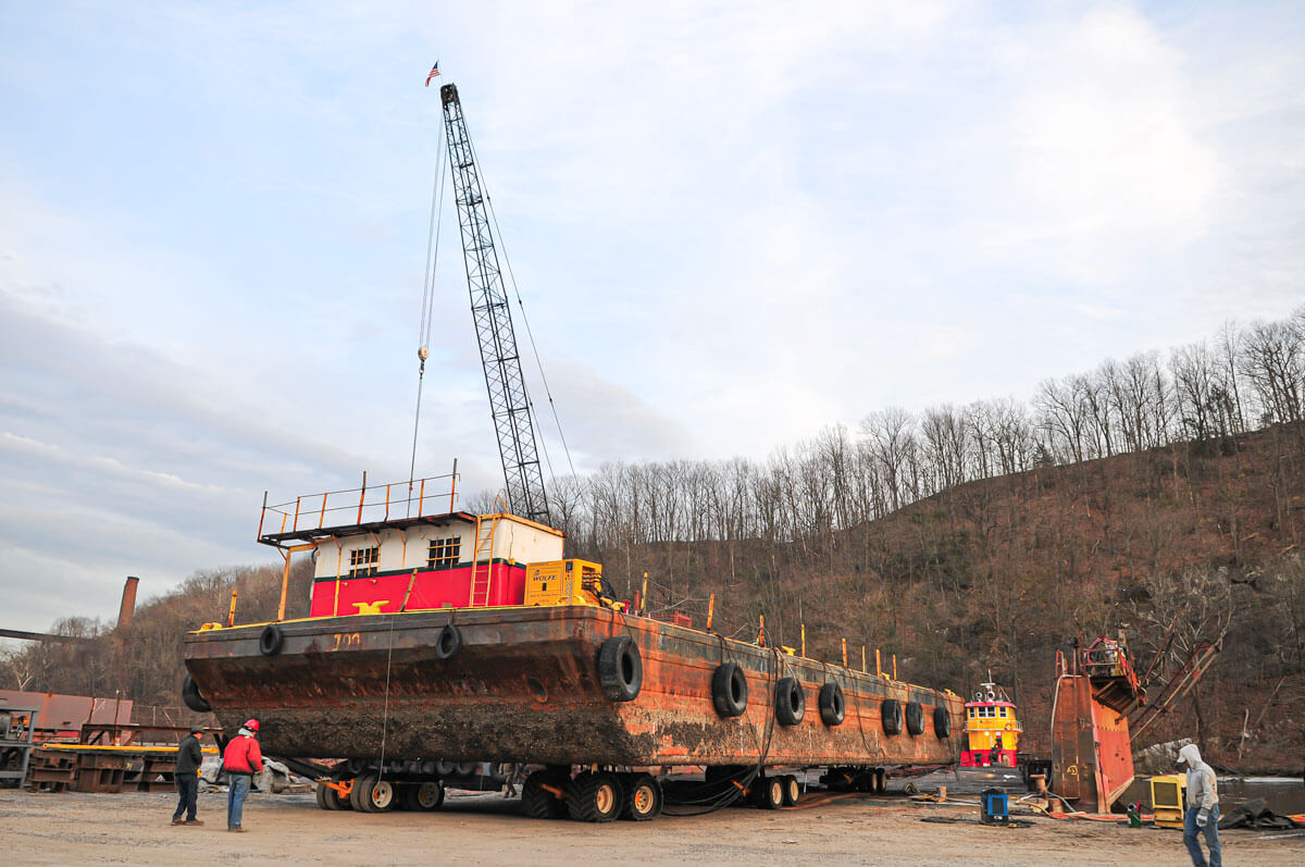 Buckingham moves a 60'x15' barge on a custom dolly transporter