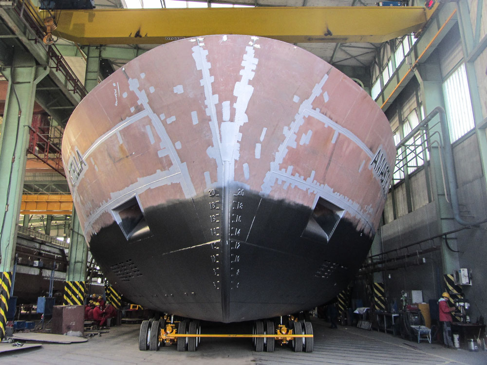Buckingham Transport relocates a 170' Serbian passenger boat from fabrication building to yard