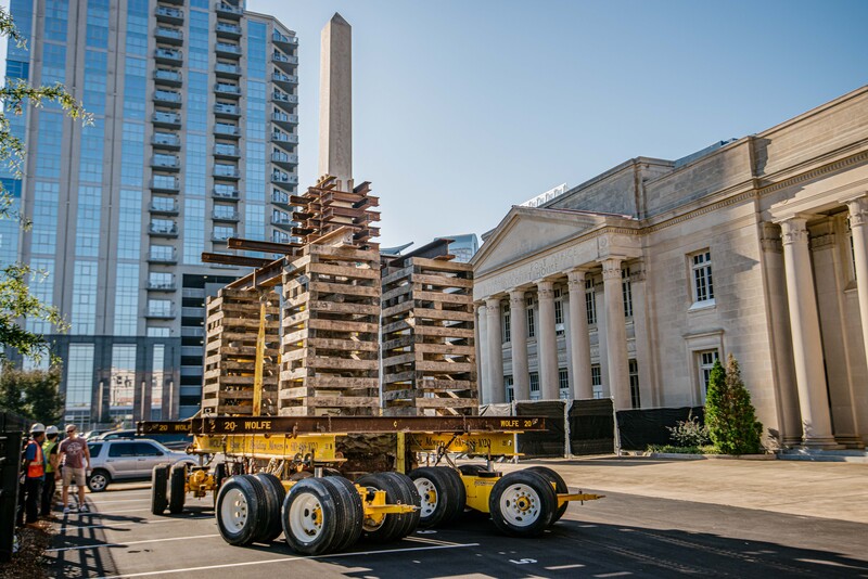 Buckingham Transport uses a beam and dolly transporter to relocate a monument
