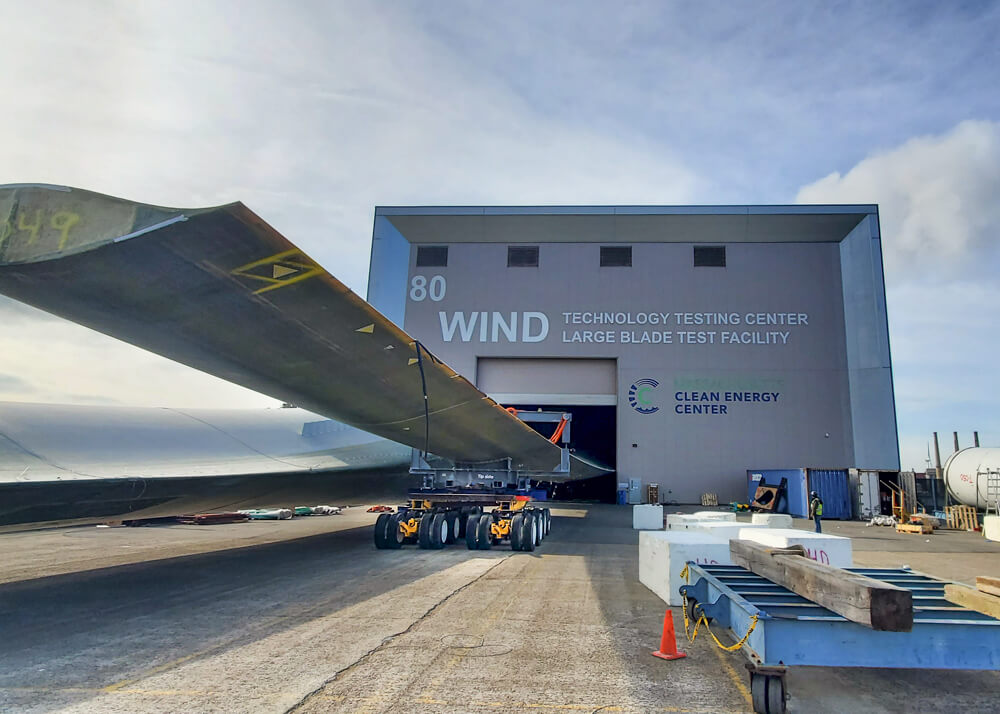Testing center with wind turbine blades on Buckingham transporter